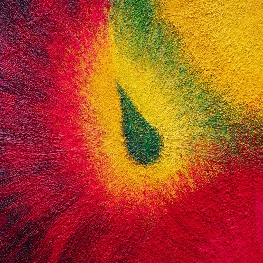 Close-up of a red and yellow zone from Responding to the Darkness Descending – Painting 1, with a green, flame-like motif emerging at the border.